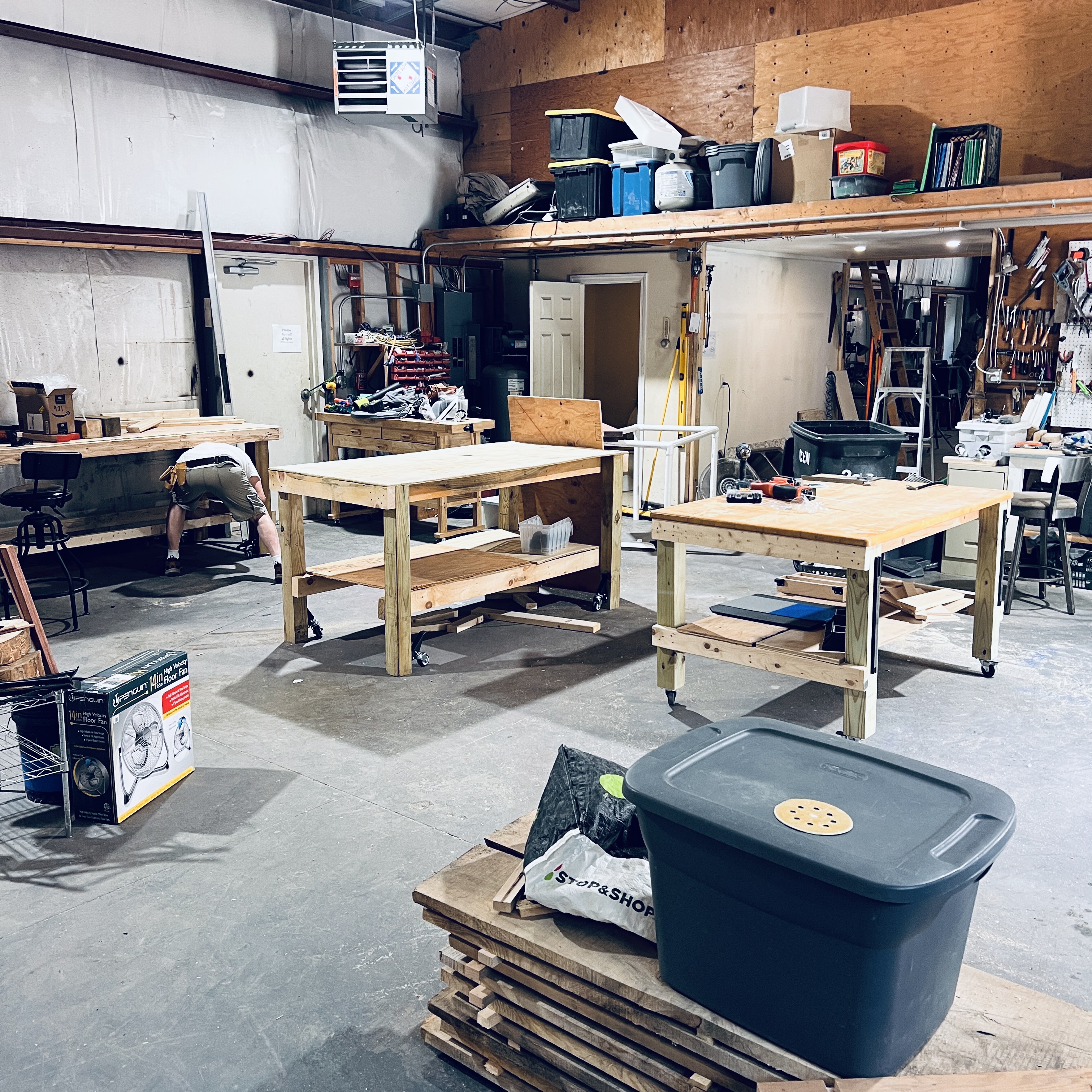 Handcrafted signature wood workbench in the foundation shop